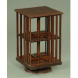 A small mahogany revolving bookcase, early 20th century,