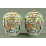 A large pair of Chinese famille rose vases and covers, 19th century,