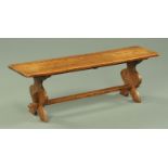 An early 20th century oak stool,