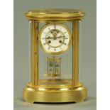 A 19th century brass cased library clock,