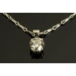 An 18 ct white gold diamond set pendant on chain, diamond weight +/- .53 carats.