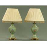 A pair of pottery and gilt metal mounted table lamps,