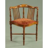 An Edwardian inlaid mahogany corner armchair,