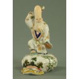 A Japanese porcelain figure of Fukurokuju, circa 1900,