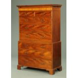 A George III mahogany tallboy, with dentil cornice above a satinwood decorated frieze,