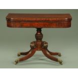 A Regency mahogany ebony strung turnover top tea table, with rounded corners,
