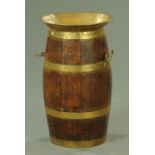 A late Victorian brass bound barrel, with carrying handle to either side and flared lip,