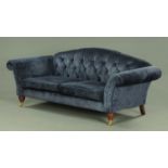 A Laura Ashley Chesterfield settee, with two loose cushions,