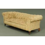 A Victorian mahogany Chesterfield settee, deep buttoned,