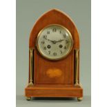 An Edwardian mahogany and inlaid lancet top mantle clock,