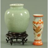 A Japanese Kutani vase, circa 1900, decorated with birds amongst blossoming flowers, signed Kutani,