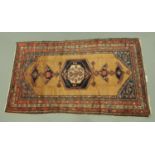 A North West Persia Kurdish rug, with centre rectangular panel,