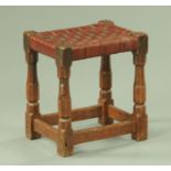 A Robert Mouseman Thompson of Kilburn stool, dark oak,