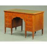 An Edwardian inlaid mahogany desk,