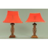 A pair of Chinese hardwood table lamps, each with rectangular shade.