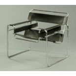 After Marcel Breuer, a "Wassily" leather and tubular chrome armchair, 77 cm wide,