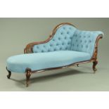 A Victorian mahogany chaise longue, with exposed moulded showframe,