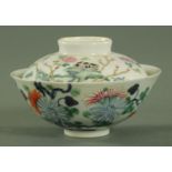 A Chinese Wucai bowl, 18th/19th century, decorated throughout with carnations and peony,