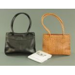 Two Osprey handbags, one black leather with silver grey interior and with dust bag,