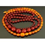 A butterscotch amber bead necklace, with olive shape graduated beads, largest 2 cm, 34.