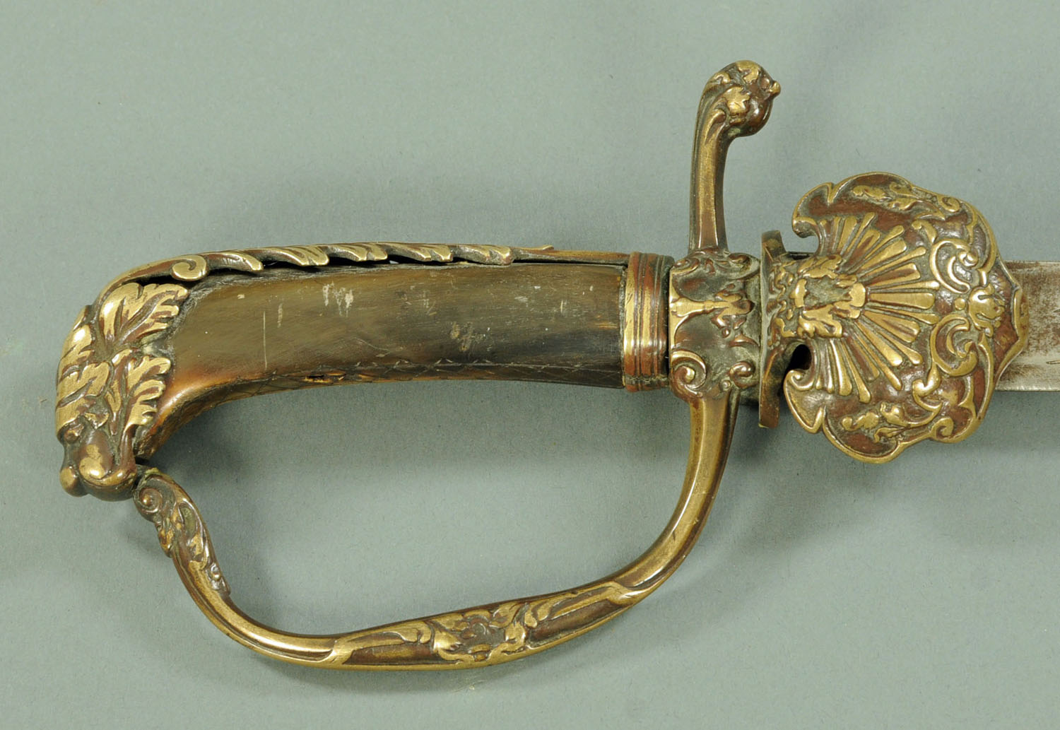 A 19th century Prussian dress sword, the part fullered blade with engraved decoration,