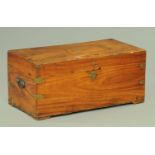 A 19th century brass bound camphorwood box, with cast iron carrying handles to the sides,