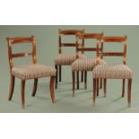 A set of four Regency mahogany dining chairs, with bowed top rails,