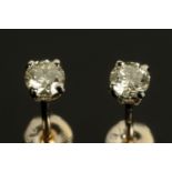 A pair of 18 ct white gold diamond stud earrings, total diamond weight +/- .41 carats.