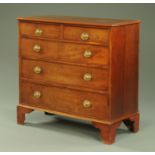 A George III mahogany chest of drawers,