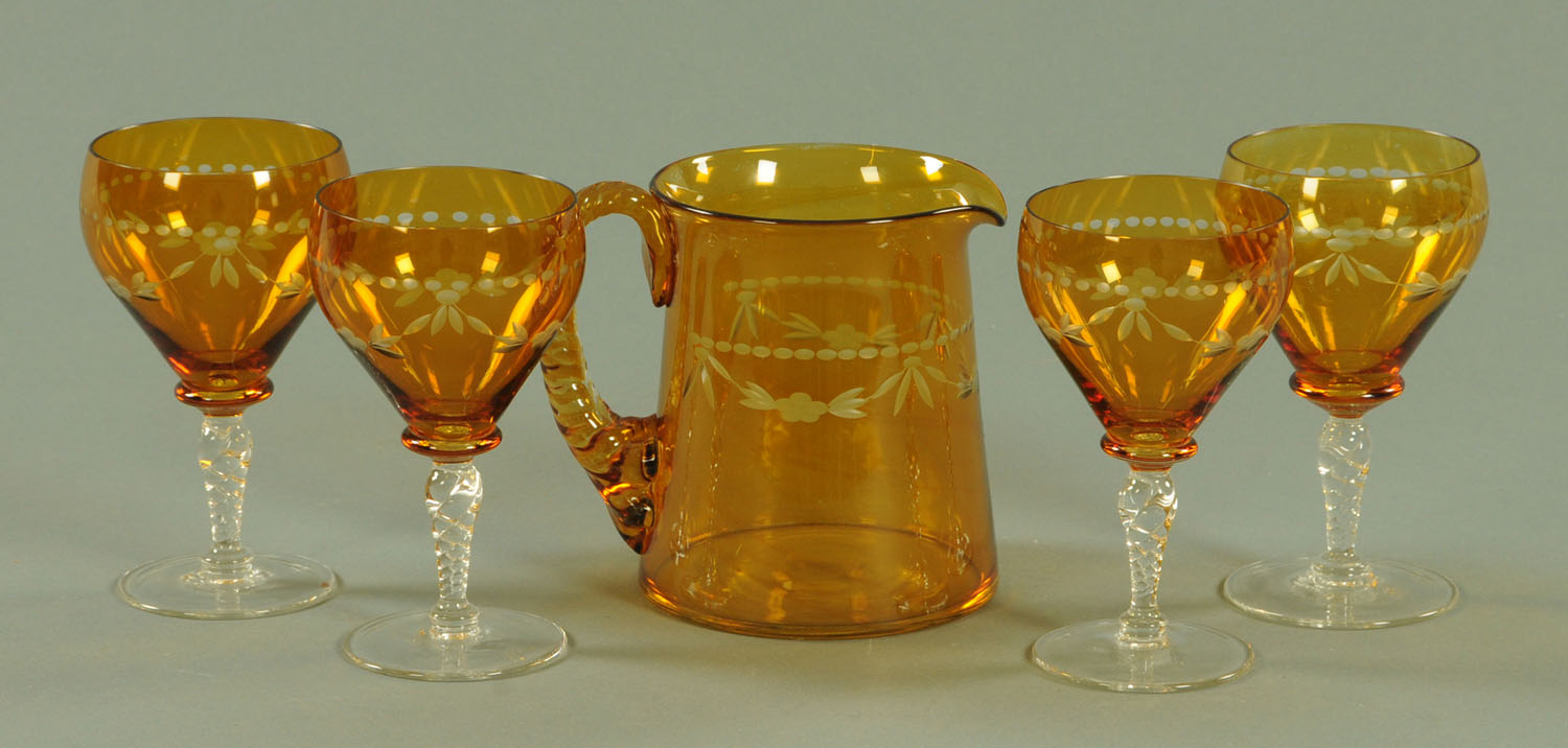 An amber flash lemonade set, mid 20th century, comprising jug and four glasses,