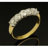 An 18 ct two tone gold diamond set half eternity ring, total diamond weight +/- 1.