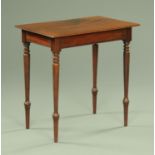 A Victorian mahogany side table, with recessed frieze and raised on turned tapered legs. Width 73.