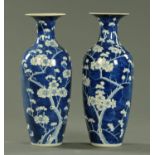 A pair of Chinese blue and white blossoming prunus pattern vases, late 19th century,