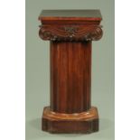 A William IV mahogany pedestal, with 55 cm square top above a faceted pedestal opening to drawers,