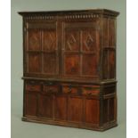 A part 17th century and later oak cupboard,