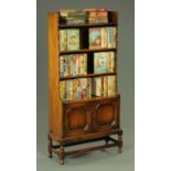 A dark stained oak open bookcase, 20th century,