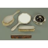 A silver backed four piece dressing table brush set, Barker Brothers Silver Limited, Birmingham,