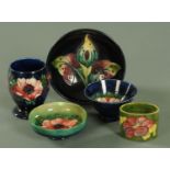 A small collection of Moorcroft, mid 20th century, comprising three footed bowls,