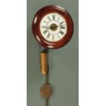 A Victorian "postman's" alarm clock, with enamelled dial.