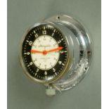 An Airguide 8 day marine clock in chromium plated case, the dial 8 cm diameter.