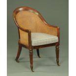 A Regency mahogany bergere armchair,