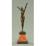 An Art Deco style bronze figure of a dancing lady, after Chiparus, raised on a marble plinth,