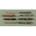 A small collection of vintage fountain pens and pencils, comprising a Conway Stewart "Dandy",