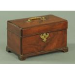 A George III mahogany casket, with brass carrying handle and lock escutcheon,