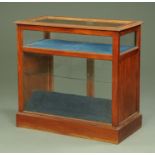 An Edwardian mahogany shop display counter, with hinged lift up top,