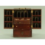 A George III mahogany apothecary chest, with brass carrying handle,