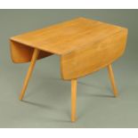 An Ercol light elm drop leaf table, supported upon square tapering legs.