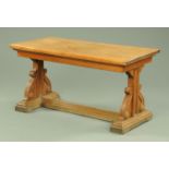 An Arts & Crafts oak Puginesque low side table, with moulded edge and recessed frieze,