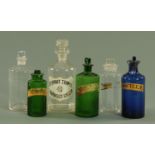 Six coloured and clear glass chemist bottles, 19th century and later, labelled for lavender water,