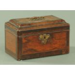 A George III mahogany casket, with brass carrying handle, crossbanded. Width 23.5 cm.